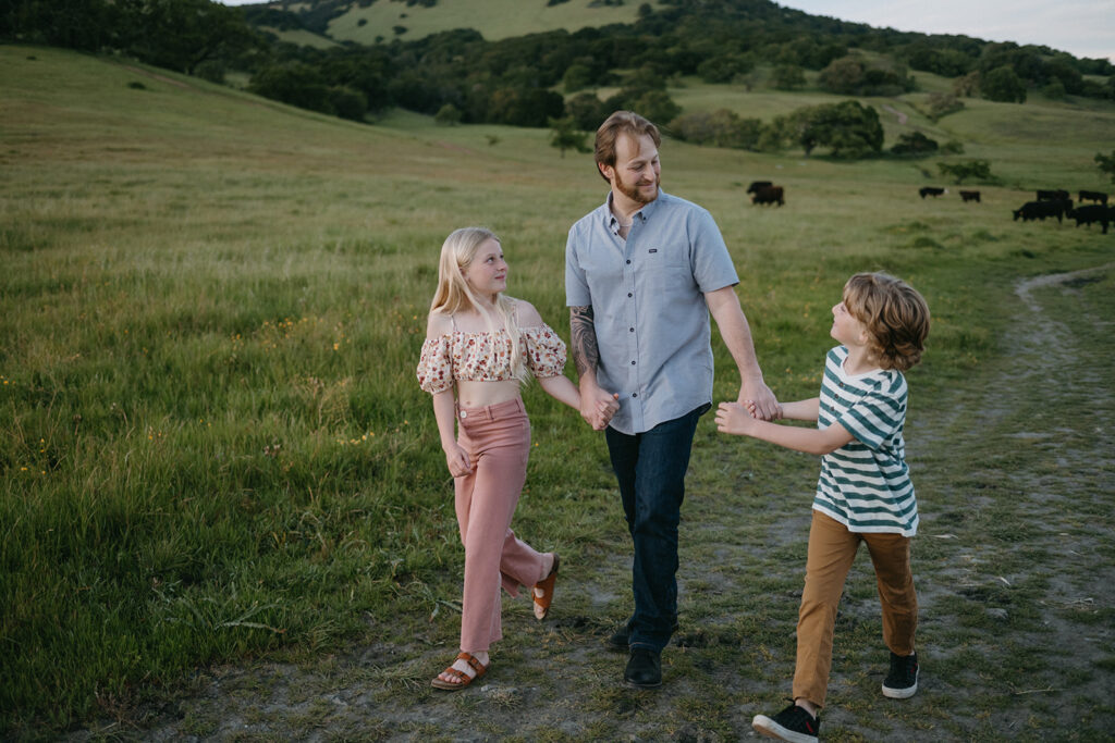 dad with kids during photoshoot of family session in novato