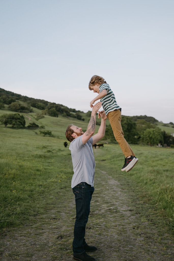 dad with kids during photoshoot of family session in novato