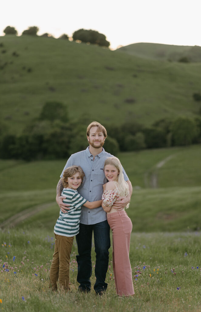 dad with kids during photoshoot of family session in novato