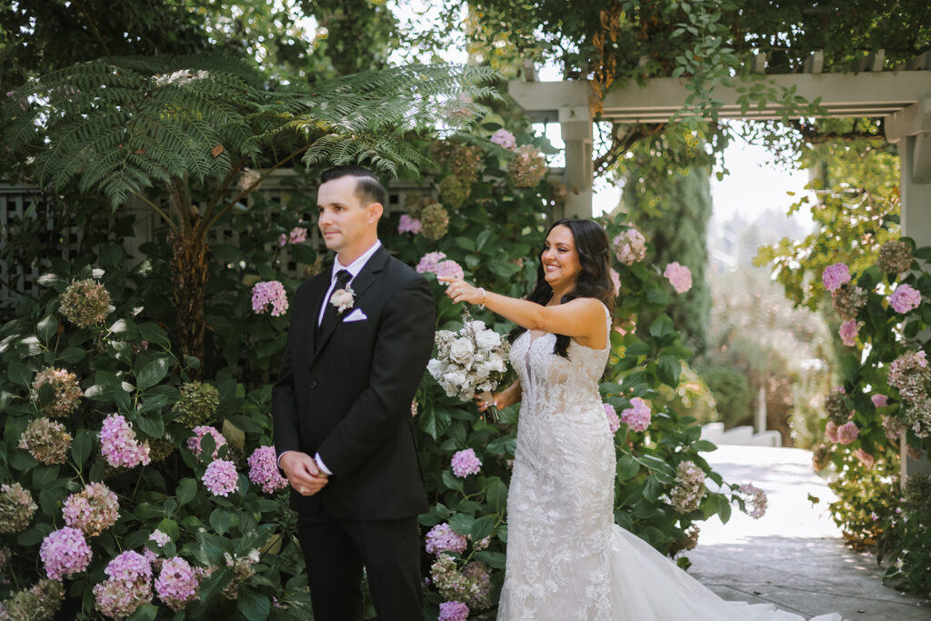 bride and groom first look at vine hill house