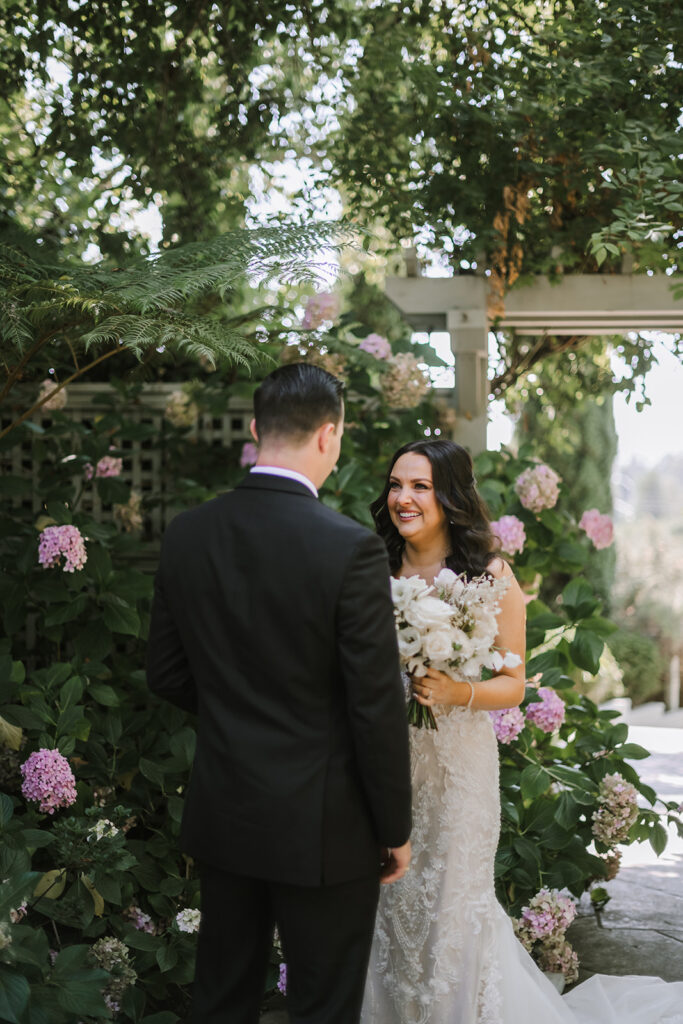 bride and groom first look at vine hill house