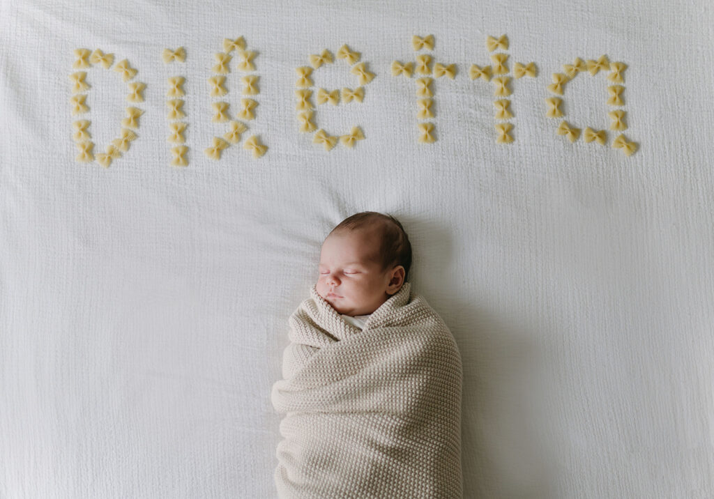 beautiful baby girl sleeping during her photoshoot