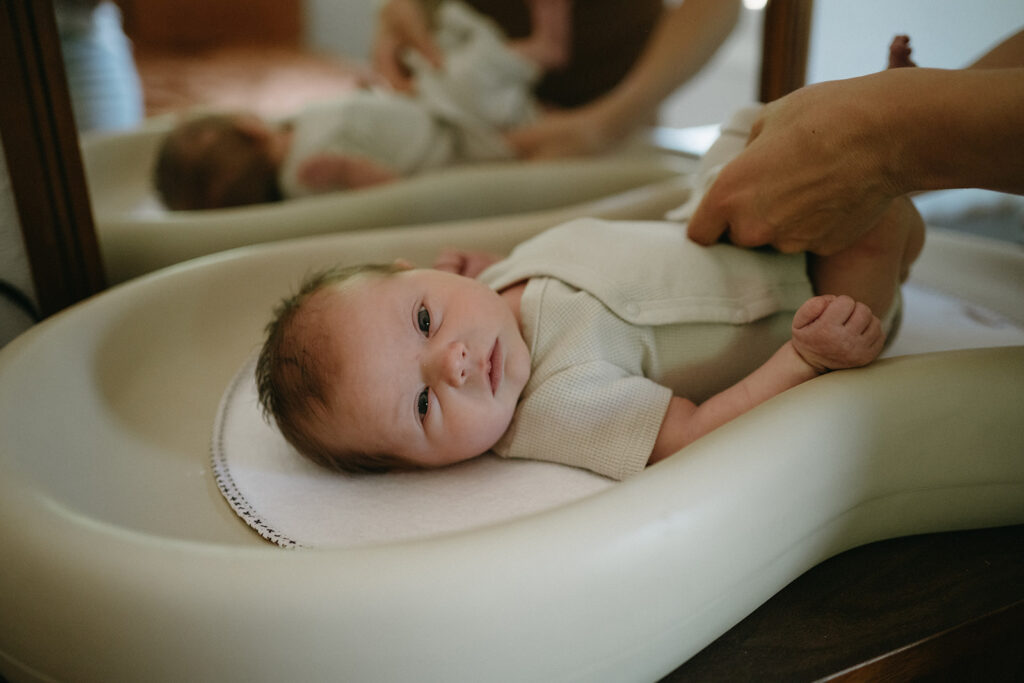 cute newborn baby looking at the camera