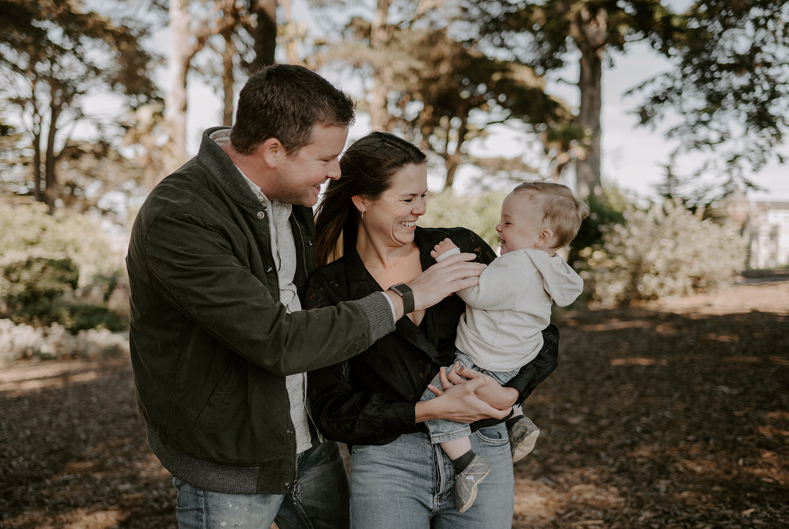 happy family at their fall family photoshoot