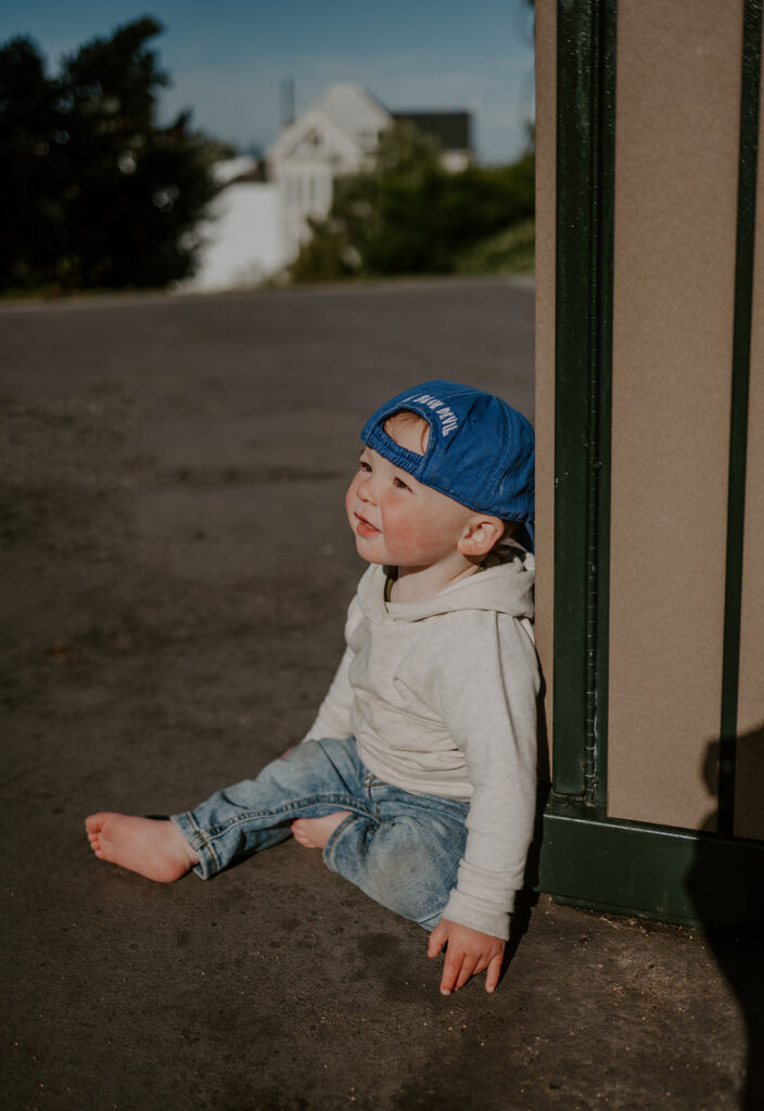 little boy playing during his photoshoot